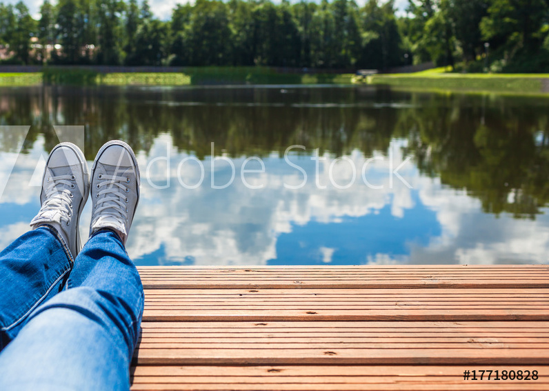 background image lady sitting on dock